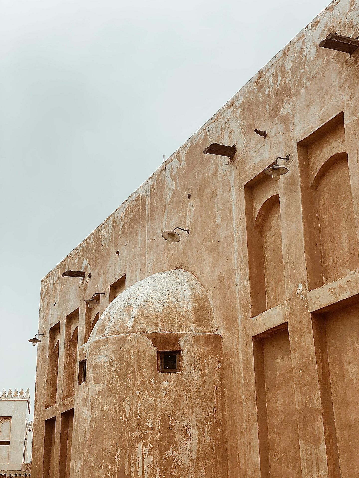 a large building with a dome and several windows